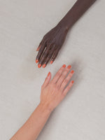 Hands wearing J. Hannah nail polish in Saltillo