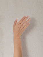 Hand wearing J. Hannah nail polish in Agnes.